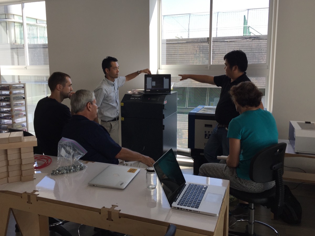 Teachers in a hands-on design workshop with Mark Schreiber